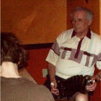 Monsignor Charlie Coen and the back or Kara's head